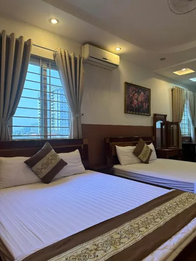 デラックスクアドルプルルーム — Hưng Phát Hotel Tân Phú